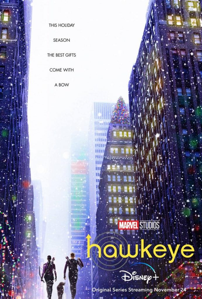 Two figures with bows and arrows across they backs are surrounded by tall skyscrapers with snow flying around in the poster for the Disney+ show Hawkeye.