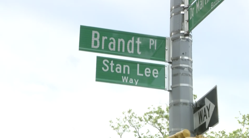 A street sign shows Stan Lee Ways underneath Brandt Pl in New York City